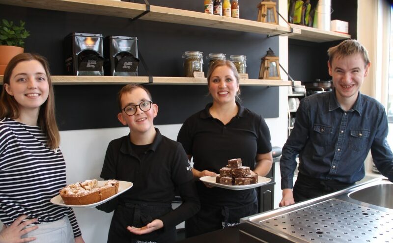 Director Charlotte Rixten with employees of the café
