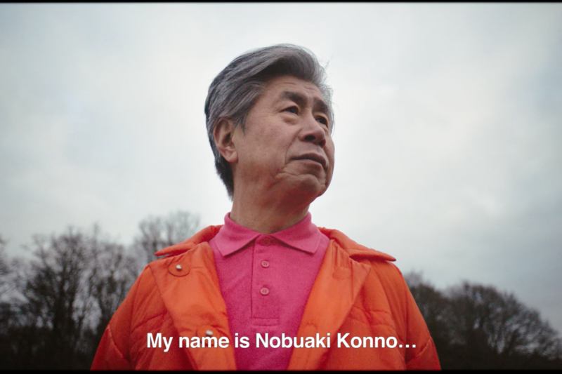 Lisa Konno's father wears a creation she designed in pink and orange